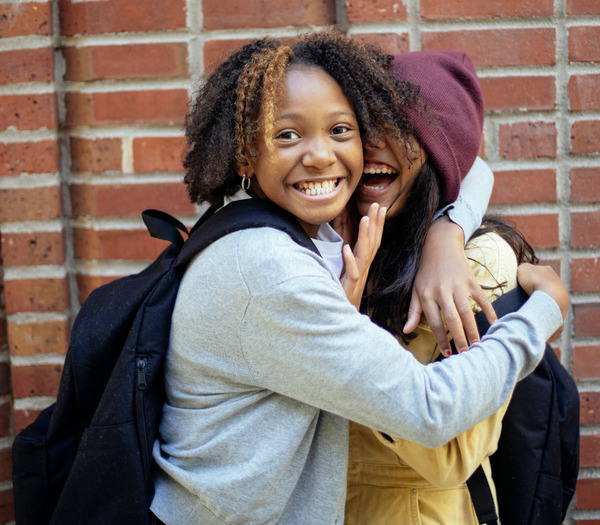 Investing in Girls.<br /> Building Stronger Communities.